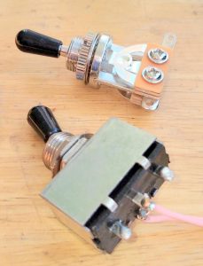 Damaged pickup switch and it's replacement